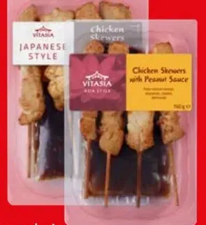 Chicken skewers with peanut sauce or soy-chili sauce